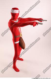 16 2019 01 JOEL ADAMSON CHRISTMAS VILLAIN WITH TWO GUNS